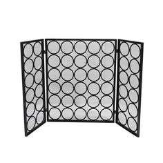 three panel black iron screen with circles on the front and back panels, set against a white background