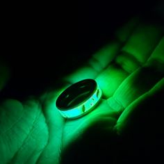 This Ring Was A Custom Order Direct From Stoic Rings. Here Are All Of The Specs: Size Mens: 10 Width: 8mm Materials: Core: Tungsten Filler Materials: Lime Green Glow Powder, Diamond Dust, Meteorite Chunks, And Blue Crystals. Condition: 9/10, Just A Few Minor Scuffs From Normal Wear. The Green Glow Is Extremely Bright And Lasts For Hours. Also The Glow Powder Will Glow In A Pitch Black Room Without Any Charge As Well. It Pretty Much Glows All The Time. Feel Free To Message For Any Questions. Than Glow Ring, Meteorite Ring, Diamond Dust, Black Room, Pitch Black, Ring Mens, Mens Accessories Jewelry, The Glow, Gray Green