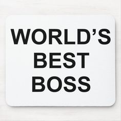 a mouse pad with the words world's best boss in black and white on it