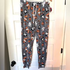 Super Soft And Comfy! Brand New With Tags - The Tag Has A Rip Elastic Waist With A Drawstring No Pockets 95% Polyester 5% Spandex Hello Kitty In Classic Halloween Costumes! Witch, Mummy, Skeleton, Ghost And Cute Jack O Lanterns Too! From Sanrio Every Order Ships With A Small Free Gift! Smoke Free, Pet Friendly Home Orange Sleepwear For Halloween, Halloween Costumes Witch, Halloween Pajama Pants, Fluffy Sweatshirt, Skeleton Ghost, Christmas Pajama Pants, Classic Halloween Costumes, Jack O Lanterns, Pajama Lounge