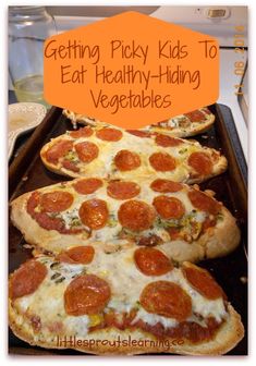 three pizzas sitting on top of a pan with the words getting picky kids to eat healthy - hiding vegetables