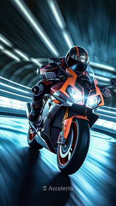 a man riding on the back of a motorcycle through a tunnel with lights behind him