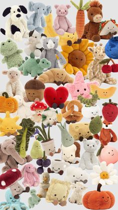 a large collection of stuffed animals are shown