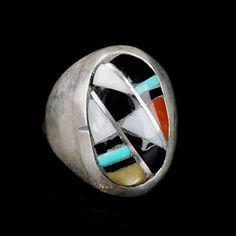 Wonderful Vintage Zuni Ring by Ralph and Lillie Kallestewa, they have been active jewelers since the 1950s.This ring is a  Multi Stone Sterling Silver Inlay, with Turquoise, Jet, Mother of Pearl and Coral.  This ring will look great on both men and women. Size 10 1/2 Measures 1 " tall Weight 18.9 grams Artisan Rings With Inlay For Anniversary, Collectible Multi-stone Turquoise Oval Ring, Multicolor Oval Inlay Rings, Oval Multicolor Rings With Inlay, Southwestern Oval Multi-stone Rings, Modernist Multi-stone Ring, Southwestern Style Oval Multi-stone Rings, Oval Multicolor Rings For Collectible, Vintage Multicolor Oval Jewelry