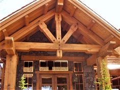 the front entrance to a large wooden building