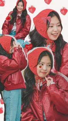 two girls wearing red jackets and hats with hearts on them