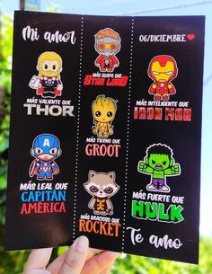 the avengers stickers are being held up in someone's hand