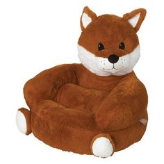 a stuffed fox is sitting in a chair