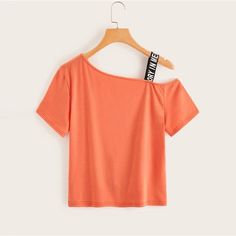 Want a cool and stylish tee for your casual meetups? Something that can make a statement without putting much of an effort? Then the Orange Letter Print Open Shoulder Tee for Women would be a great choice for you. Pair it with your favorite pair of jeans or cute little shorts, and you are all ready. It is available in the orange shade and can be bought in sizes ranging from S to XL. So go get this adorable shirt right now! Material: Polyester, Spandex, Cotton Neckline: Crewneck Sleeve Length: Sh Trendy Orange Tops For Streetwear, Summer Orange Tops With Slogan, Orange Summer Tops With Text Print, Orange Text Print Top For Summer, Trendy Orange Tops With Text Print, Trendy Orange Top With Text Print, Orange Short Sleeve Top With Slogan, Casual Orange Tops With Letter Print, Women Slogan