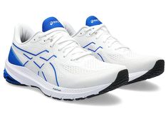 ASICS GT-1000(r) 12 - Men's Shoes : White/Illusion Blue : Featuring an external heel counter that improves the fit and helps increase stability, the ASICS GT-1000 12 Running Shoes protect your feet while your walk uneven terrain. Polyester and synthetic mesh upper. LITETRUSS technology is placed on the midsole's inside angle to reduce pronation. Synthetic overlays on the upper. Lace-up closure. Signature brand detailing on the back. Polyester and synthetic mesh lining. OrthoLite X-30 footbed with rearfoot GEL technology that improves impact absorption and creates a softer feeling at footstrike for added comfort. Rubber outsole. Imported. Asics Running Shoes With Breathable Mesh, Asics Running Shoes With Breathable Mesh For Marathon, Asics Functional Running Shoes With Breathable Mesh, Asics Running Shoes With Breathable Mesh For Training, Technical Asics Running Sneakers, Asics Breathable Sneakers For Marathon, Asics Dynamic Sneakers With Breathable Mesh, Asics Breathable Training Sneakers, Asics Trail Running Shoes For Training