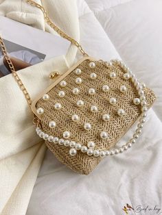 BirdinBag - Chic Straw Bag with Faux Pearl Decor and Chain Strap - Ideal for Summer Travel Summer Beige Bag With Chain Strap, Beige Bags With Chain Strap For Summer, Beige Bag With Chain Strap For Summer, Summer Chain Detail Rectangular Bag, Gold Crossbody Shoulder Bag With Pearl Handle, Large Capacity Beige Shoulder Bag For Party, Beige Large Capacity Shoulder Bag For Party, Gold Shoulder Bag For Spring, Chic Summer Bag With Chain Detail