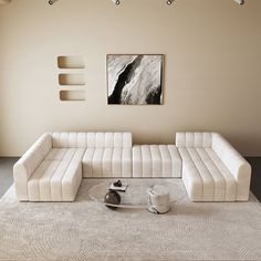 a living room with a large white couch