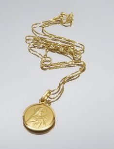 "St Teresa of Little flower, 18 kt gold over sterling silver pendant, St Teresa of Little Jesus, catholic saint medal, gift medal for women, -round medal -the size of the medal: 15mm -chain length:40cm (16\") or 45cm(18\")" Gold Miraculous Medal Jewelry, Yellow Gold Miraculous Medal As Gift, Yellow Gold Necklaces For Commemoration, Jesus Gift, St Teresa, Catholic Saint, Saint Teresa, Saints Medals, Round Pendant