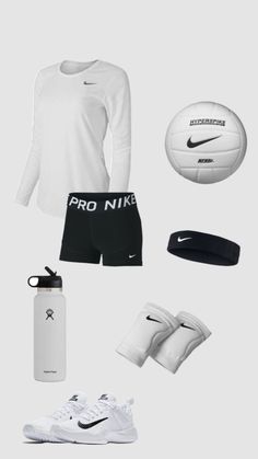 a white shirt and black shorts are arranged in the shape of a nike basketball ball