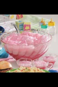 a table topped with lots of food next to plates and bowls on top of it