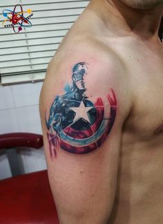 a man with a captain america tattoo on his arm