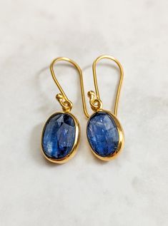 Kyanite drop earrings. These beautiful earrings give a little oomph to your everyday look, and are perfect for any occasion you have coming up. Finished in gold vermeil. Also available in sterling silver. Shop our full earring collection at: https://tanviblue.etsy.com?section_id=49237495 Gold Sapphire Dangle Earrings, Gold Sapphire Drop Earrings, Gold Sapphire Earrings Gift, Elegant Blue 14k Gold-filled Earrings, Elegant Blue 14k Gold Filled Earrings, Earring Collection, Blue Gems, Quiet Luxury, Silver Shop