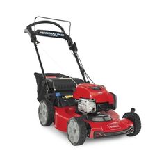 a red lawn mower on a white background