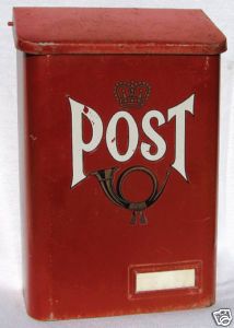 a red post box with the word post on it