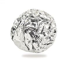 a silver ball with lots of small pieces of foil on the top and bottom side