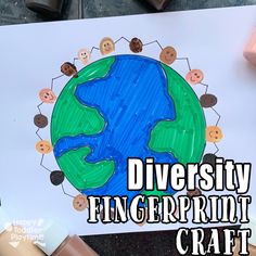 a drawing of the earth surrounded by children's faces and words that read, diversity fingerprint craft