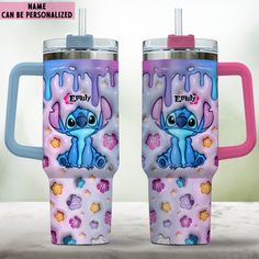 two tumblers with the same design on them, one blue and one pink are sitting next to each other