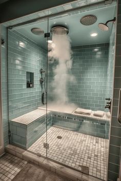 a bathroom with a steam shower and tiled walls