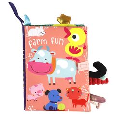 a pink bag with farm fun on it and two small toys in front of it