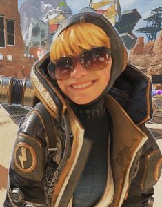 an image of a woman with sunglasses and a hoodie in the video game overwatch