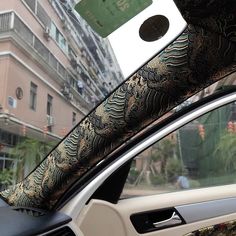 the back window of a car with an intricate design on it