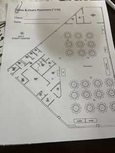 the floor plan for an event is shown on top of a piece of white paper