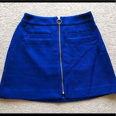 Brand New With Tags. Size 4. Cute And Trendy Express A Line Skirt. Chic Blue Skirt With Pockets, Blue Bottoms With Side Zipper For Spring, Casual Mini Skirt With Zipper For Work, Trendy Blue Mini Skirt For Day Out, Trendy Blue Workwear Skirt, Trendy Blue Skirt For Work, Chic Blue Skort For Day Out, Blue Mini Skirt For Work, Blue Casual Mini Skirt For Work