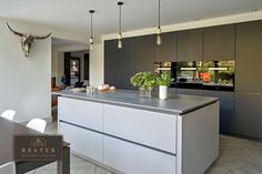 the kitchen is clean and ready to be used as a dining room or office space