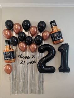 balloons and confetti are arranged in the shape of an 80th birthday sign