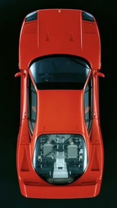 an overhead view of a red sports car