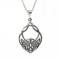 "This Celtic Wolf necklace is designed in solid Sterling Silver and comes on your choice of a 16\" or 18\" sterling chain. The pendant measures 43mm or 1.75\". ~The Celtic Wolf is a tribal design. \"If you look at the design head on, you will see the face of a wolf created with Celtic Infinity knots. If you split the design down the middle with your eyes, you will also notice two wolves baying up at each other in the lower center of the design.\"© ~The wolf symbolizes loyalty and protection. All Viking Style Sterling Silver Round Pendant Jewelry, Viking Style Silver Jewelry With Wolf Design, Viking Style Silver Wolf Design Jewelry, Viking Style Wolf Design Jewelry Gift, Viking Style Sterling Silver Nickel-free Necklace, Nickel-free Viking Style Sterling Silver Necklace, Nickel-free Sterling Silver Viking Necklace, Adjustable Viking Style Sterling Silver Jewelry, Silver Wolf Pendant Necklace