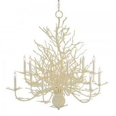 a white chandelier with candles hanging from it's center branch and branches in the middle