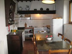 the kitchen is clean and ready to be used for dinner or other mealtimes