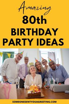 a group of people standing around a table with a birthday cake