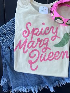 Introducing the Spicy Margs Tee, perfect for those who love a kick with their margaritas. Crafted with the spicy margarita lover in mind, this tee offers a unique blend of flavor and style. Made from top-quality materials, it's a must-have for any cocktail enthusiast. professionally printed tee brand: tultex color: soft cream comfy, unisex fit ships within 7 business days. Spicy Margs, Spicy Margarita, Fruit And Veg, Love A, Must Haves, Ships, Cream, Quick Saves, Color