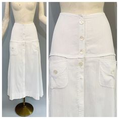 "Very special antique ribbed white cotton skirt circa 1900s to early 1920s. I've seen these referred to as both tennis and walking skirts. The skirt has pearly buttons but actually fastens with little snaps and also has front pockets. Excellent vintage condition. There is an area of very faint discoloration on the front bottom as shown in the close-up photo. Measurements: Waist - 24\" Hips - 35\" Length - 35\"" Walking Skirt, White Cotton Skirt, 1910s Fashion, Flapper Style, Gray Silk, Edwardian Fashion, Front Bottoms, Brown Coat, Cotton Skirt