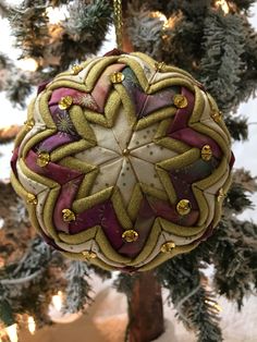 a christmas ornament hanging from a tree