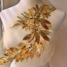 1 Piece Fine net lace with sequined Gold embroidered flowers and leaves. Size About: 15.74" x 7.48" (40cm X 19cm) wide overall. Also have in about 4 other colors. Main Fabric: Gold Mesh Net Embroidery Tread: polyester gold and black thread, Beaded with sequin.  Color:  Gold. Kindly note that due to lighting variations during photography or on your monitor, the color of the item in the photo might slightly differ from the actual product. This item will be shipped from USA, CA. Elevate your creative projects with our exquisite Gold Applique Embroidered Flowers, adorned with shimmering sequins and intricate beadwork. Whether you're a dancer, a fashion designer, or a DIY enthusiast, this versatile embellishment is sure to add a touch of elegance and sparkle to your creations. Key Features: Int Childrens Party Dresses, Ballet Attire, Pretty Dance Costumes, Net Embroidery, Gold Applique, Performance Outfits, Net Lace, Ballet Dress, Black Thread