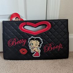 This Is A Brand New With Tags, Betty Boop Block Clutch. It Has Sparkly Lips And Embroidered Letters And The Betty Boop Is A Patent Leather / Plastic Material. It Has Magnetic Snaps For Its Closure And Has A Zippered Pocket Inside. Sparkly Lips, Black Betty Boop, Embroidered Letters, Red Clutch, Black Betty, African Lace Dresses, Large Clutch, African Lace, Lace Dresses