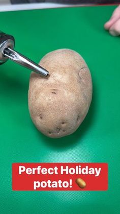 a potato being cut with a knife on a green cutting board that says perfect holiday potato