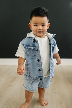 The Winston Jacket is the perfect combination of style and comfort. With its short sleeves, comfy hood, and chest pockets, this denim jacket is perfect for warm weather. Your little one will rock the look of a true rockstar in this stylish and playful jacket. Material: 75.5% Cotton/23.2% Polyester/1.3% Spandex Short Sleeve Denim Vest With Pockets, Denim Vest With Pockets And Short Sleeves, Medium Wash Short Sleeve Denim Jacket With Pockets, Short Sleeve Medium Wash Denim Jacket, Urban Style Denim Vest With Pockets For Spring, Urban Summer Outerwear With Pockets, Hooded Light Wash Denim Jacket With Pockets, Casual Short Sleeve Denim Jacket, Summer Light Wash Streetwear Outerwear