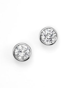 Bloomingdale's Diamond Bezel Set Stud Earrings in 14K White Gold, .50 ct. t.w. - 100% Exclusive Channel Set White Gold Round Diamond Earrings, Fine Jewelry Channel Set Round Cut Earrings, White Gold Round Diamond Earrings Channel Set, Classic Diamond Earrings With Channel Set, Diamond White Channel Set Round Cut Earrings, White Diamond Earrings Channel Set Round Cut, White Gold Channel Set Round Cut Earrings, Sterling Silver Round Cut Channel Set Diamond Earrings, Sterling Silver Diamond Earrings Channel Set Round Cut