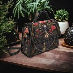 Dark Gothic Spider and Roses Motif Canvas Satchel Bag Fashioned from durable waterproof canvas and vegan leather straps, this gorgeous cottagecore crossbody bag is just what you need for a little extra room for all of your essentials. Made from high quality materials, this cottagecore style boho bag features a secure magnetic snap closure and adjustable shoulder strap. Can be used as a nice iPad storage bag, leisure travel tote bag, crossbody messenger bag, etc. 🤎 Made from high-grade waterproo Gothic Satchel Gift Bags, Gothic Bags For Halloween Gift, Gothic Satchel Bag As Gift, Gothic Satchel Bag For Gift, Gothic Halloween Gift Bags, Gothic Rectangular Bag For Gift, Gothic Rectangular Gift Bag, Cottage Goth, Gothic Spider