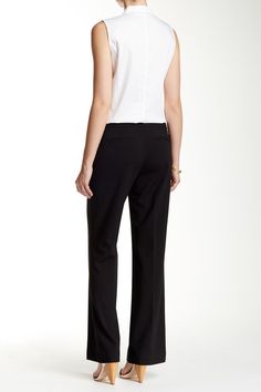 A wide leg trouser offers a modern option for your office attire with a mid-rise profile cut from solid suiting fabric. Zip fly with hook-and-bar/button tab closure. 2 front slant pockets. 2 back welt details. Classic fit. Lined. Approx. 9" rise, 33" inseam (size 2). Imported Modern Stretch Calvin Klein Bottoms, Modern Fitted Calvin Klein Bottoms, Tailored Elastane Business Casual Pants, Stretch Tapered Leg Dress Pants For Work, Stretch Work Pants With Welt Pockets For Office, Spring Business Elastane Pants, Spring Business Pants In Elastane, Spring Business Pants Made Of Elastane, Tailored Straight Leg Dress Pants For Career