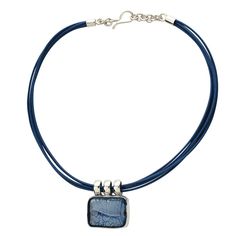 This handmade necklace is made of sterling silver and Murano glass. The rectangular pendant hangs from the cord through three silver rings. The glass bead is manually set in a expressly made silver frame. It is made with a process similiar to the "sommerso" technique, that consists on a layer of colored glass with the inclusion of a platinum leaf, coated with a crystal layer.This necklace gives a casual and youthful appearance. The price is intended for the necklace as pendant + cord. The glass has been handcrafted in Venice, then mounted and finished in Florence. See all the Sommerso Collection Orange Gold, Handmade Necklace, Silver Frame, Murano Glass, Glass Bead, Colored Glass, Handmade Necklaces, Florence, Glass Beads